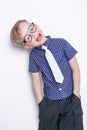 Portrait of a little boy in a funny glasses and tie. School. Preschool. Fashion. Studio portrait isolated over white background Royalty Free Stock Photo