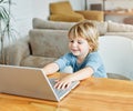 child laptop computer technology home boy son man education homework kid learning internet childhood student sitting Royalty Free Stock Photo