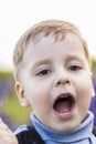 Portrait of a little boy making a strange face