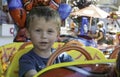 Portrait of little boy in a merry-go-round Royalty Free Stock Photo