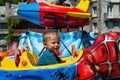 Portrait of little boy in a merry-go-round Royalty Free Stock Photo