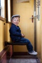 Portrait of a little boy in a old steam train Royalty Free Stock Photo