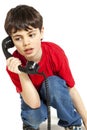 Portrait of little boy on the phone