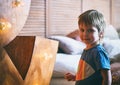 Portrait of a little boy smiling face and looking at camera, Happy kid relaxing at home on weekend. Royalty Free Stock Photo