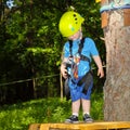 Portrait of a little boy in a special outfit for climbing