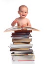 Portrait of a little boy with a stack of books Royalty Free Stock Photo