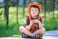 Portrait of a little boy in summer forest Royalty Free Stock Photo