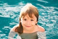 Portrait of little boy swim in sea. Kid laughing in water of waves at sea. Funny kids face. Royalty Free Stock Photo