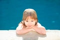 Portrait of little boy in swimming pool. Concept of kids face. Head shoot children portrait. Kid relax in pool side. Royalty Free Stock Photo