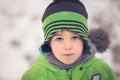 Portrait of a little boy in winter