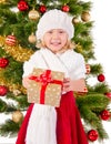 The portrait of the little child smiling and holding present box