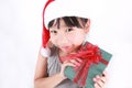 Portrait of little cute asian girl wearing red hat Royalty Free Stock Photo