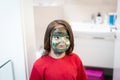 Portrait of little cute boy smiling with painted face Royalty Free Stock Photo