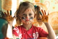 Portrait of little cute girl with paint of face. Royalty Free Stock Photo