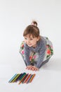 Portrait of a little cute girl sitting on the floor Royalty Free Stock Photo