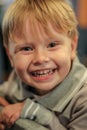 Portrait of a little cute smiling blonde hair boy Royalty Free Stock Photo