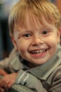 Portrait of a little cute smiling blonde hair boy Royalty Free Stock Photo