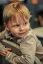 Portrait of a little cute smiling blonde hair boy Royalty Free Stock Photo