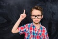 Portrait of little genious in glasses having great idea Royalty Free Stock Photo