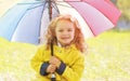 Portrait of little girl child with colorful umbrella Royalty Free Stock Photo