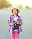 Portrait of little girl child photographer with retro camera Royalty Free Stock Photo