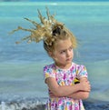 little girl with a coral crown on her head Royalty Free Stock Photo