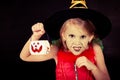 Portrait of little girl in costume witch on Halloween Royalty Free Stock Photo