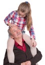 Portrait of a little girl enjoying piggyback ride with her grand Royalty Free Stock Photo