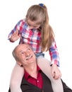 Portrait of a little girl enjoying piggyback ride with her grand Royalty Free Stock Photo