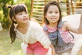 Portrait little girl with friends. cute kid in nature park. Royalty Free Stock Photo