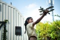 Portrait of a little girl in the front yard. with model aircraft which is the dream Royalty Free Stock Photo