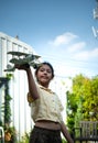 Portrait of a little girl in the front yard. with model aircraft which is the dream Royalty Free Stock Photo