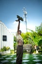 Portrait of a little girl in the front yard. with model aircraft which is the dream Royalty Free Stock Photo