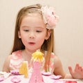 Portrait of little girl and her birthday cake Royalty Free Stock Photo