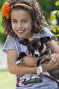 Portrait of little girl with her dog