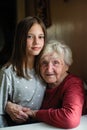 Portrait of little girl and her grandmother. Love.