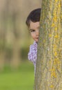 Portrait of a little girl hiding Royalty Free Stock Photo