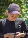 Portrait of a little girl holding chickens in her hands. Happy girl with little chicks in the fresh air. Portrait of a charming Royalty Free Stock Photo