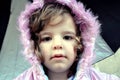 Portrait of little girl in hooded coat