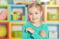 Portrait of a little girl making funny faces Royalty Free Stock Photo