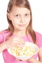 Portrait of a little girl with popcorn on white Royalty Free Stock Photo