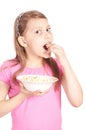 Portrait of a little girl with popcorn on white Royalty Free Stock Photo