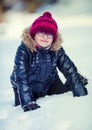 Portrait of a little girl in the snow. Winter joy of a child of a lot of snow Royalty Free Stock Photo