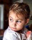 Portrait of a little girl staring at something Royalty Free Stock Photo