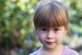 Portrait of little girl with surprised expression on face Royalty Free Stock Photo