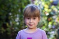 Portrait of little girl with surprised expression on face Royalty Free Stock Photo