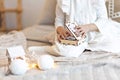 Portrait of a little girl Toddler with a headband on her head in the form of deer horns and a Christmas toy in her hands. Royalty Free Stock Photo