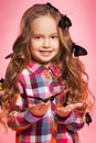 Portrait of a little girl with tropical butterflies. Royalty Free Stock Photo