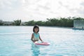 Portrait little girl trying learn swimming Royalty Free Stock Photo