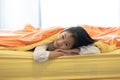 Portrait of little girl under blanket in the bedroom at home,child and home concept